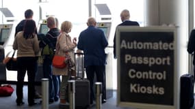 Des passagers à l'aéroport international de Miami, le 4 mars 2015 à Miami, en Floride.