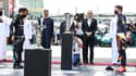 Stefano Domenicali entre Lewis Hamilton et Max Verstappen, lors du GP d'Abu Dhabi. 