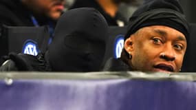 Le rappeur Kanye West avec une cagoule intégrale lors du match Inter-Atlético, le 20 février 2024