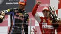 Fernando Alonso fête son quatrième succès de l'année derrière Mark Webber qui sabre le champagne