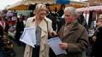 Marine Le Pen sur le marché d'Hénin-Beaumont. Déterminée à faire du Nord-Pas-de-Calais un tremplin de la reconquête du FN, Marine Le Pen vise dimanche la seconde place de la triangulaire l'opposant au président socialiste sortant Daniel Percheron et à l'U