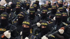 Des militants palestiniens du mouvement Jihad islamique participent à un défilé militaire anti-israélien marquant le 36e anniversaire de la fondation du mouvement dans la ville de Gaza, le 4 octobre 2023.