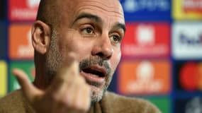 L'entraîneur espagnol de Manchester City Pep Guardiola, lors d'une conférence de presse, le 8 mars 2022 à l'Académie de football de Manchester, à la veille du 8e de finale retour de la Ligue des Champions contre le Sporting Lisbonne