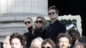 Laeticia Hallyday, Laura Smet et David Hallyday, le 9 décembre 2017 à l'église de la Madeleine à Paris. 