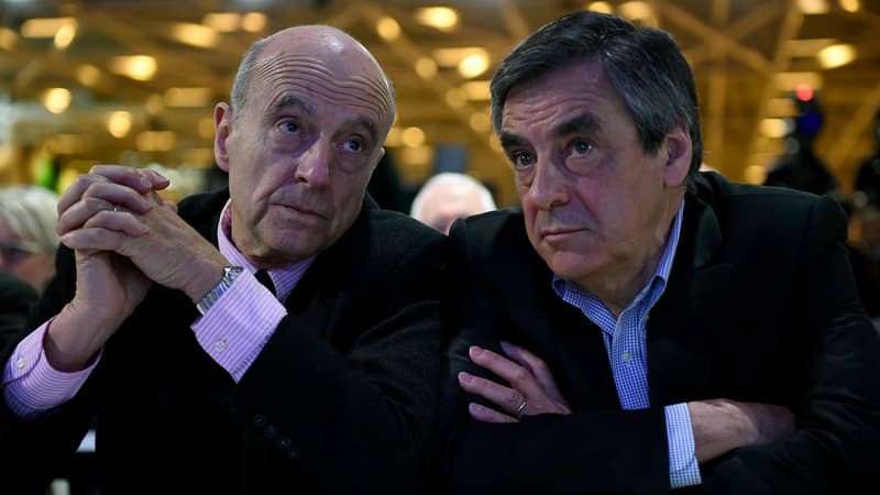 Alain Juppé et François Fillon, les deux finalistes de la primaire à droite, le 13 février 2016 à Paris.
