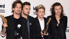 Louis Tomlinson, Liam Payne, Niall Horan, et Harry Styles du groupe One Direction.