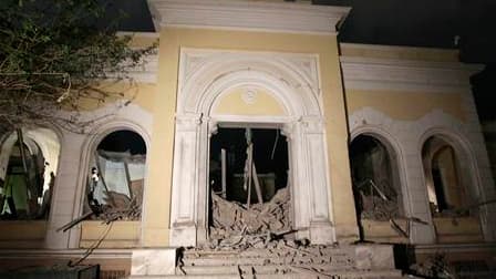 Le bâtiment de la Haute commission libyenne pour l'enfance, à Tripoli, qui aurait été bombardé par l'Otan selon les autorités libyennes. L'Otan a tiré mardi des missiles contre plusieurs objectifs dans le secteur de la capitale libyenne, au nombre desquel