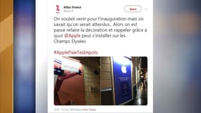 Des militants d'Attac ont mené une action au futur Apple Store des Champs-Elysées.