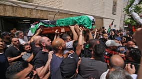Le cercueil de Shireen Abu Akleh à Jérusalem  AHMAD GHARABLI - AFP 