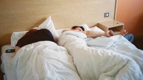 Deux personnes en train de dormir (Photo d'illustration).