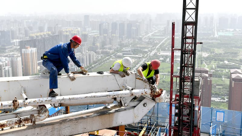 Les ruraux qui viennent travailler en ville n'ont pas les mêmes droits que les citadins: la Chine veut mettre fin au système qui pénalise les travailleurs migrants