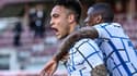L'attaquant argentin de l'Inter Milan, Lautaro Martinez, célèbre son but avec le milieu de terrain anglais Ashley Young, lors du match de Série A contre le Torino, le 14 mars 2021 à Turin