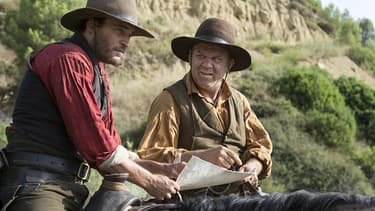 Joaquin Phoenix et John C. Reilly dans Les Frères Sisters
