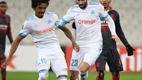 Luiz Gustavo et Adil Rami