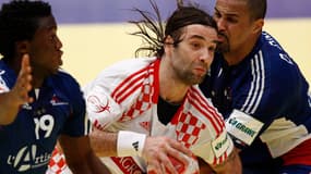 Didier Dinart face à Ivano Balic