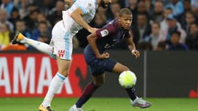 Adil Rami face à Kylian Mbappé