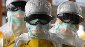Ebola : des membres du personnel soignant au Libéria.