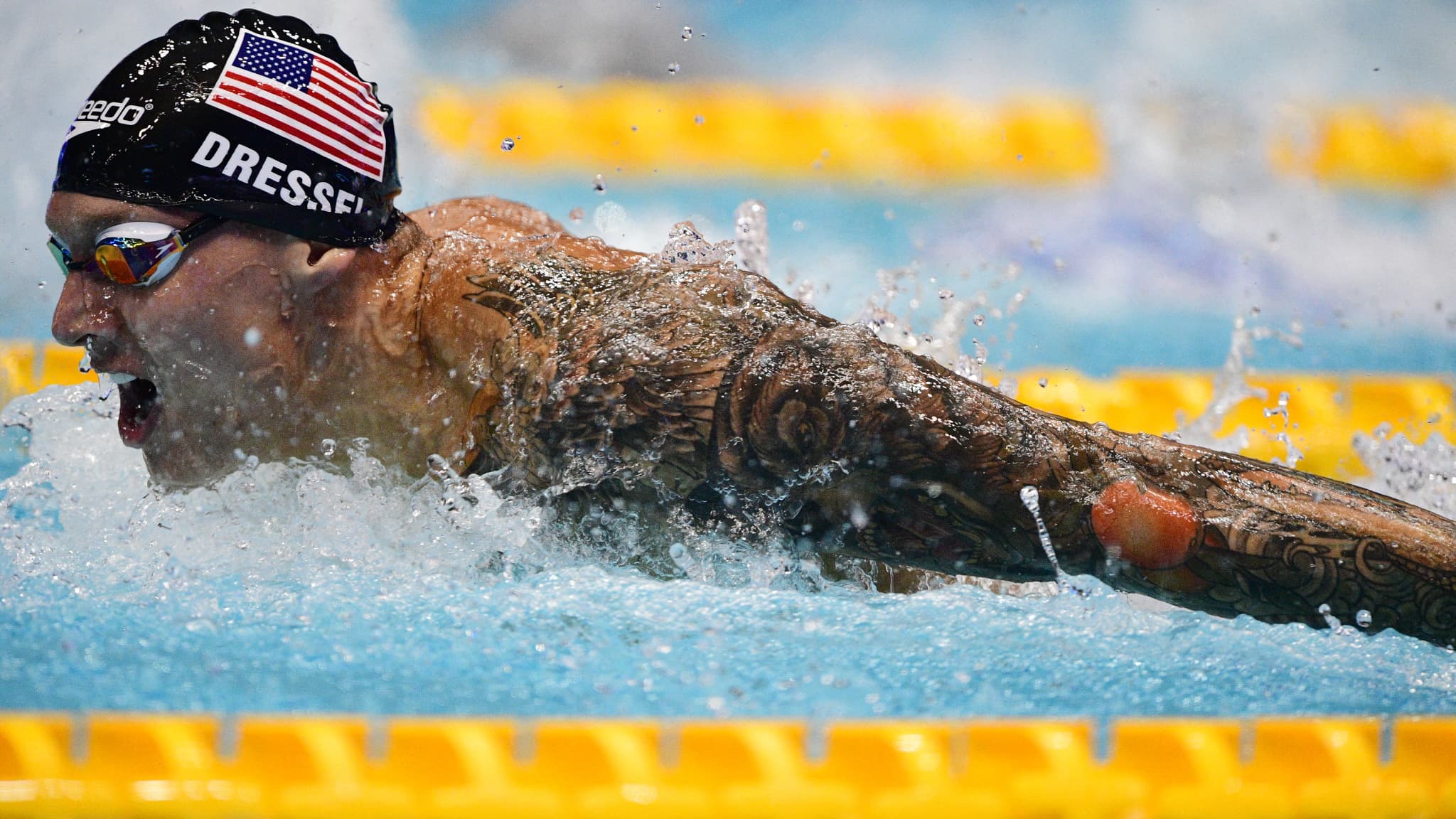 Caeleb Dressel lors d'un 100 mètres papillon en août 2018