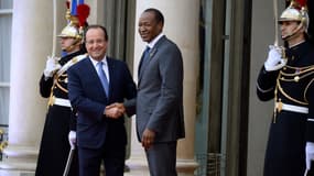 François Hollande et son homologue burkinabè Blaise Compaoré, en décembre 2013, à Paris. 