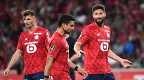 Les Lillois Thomas Meunier, Benjamin André et Olivier Giroud pendant un match de Ligue 1, le 24 août 2025