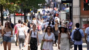 Londoniens dans la rue ce 19 juillet. 