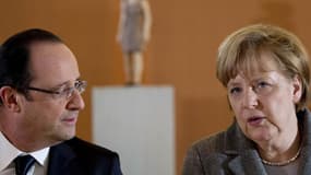 François Hollande et Angela Merkel vont tenter d'afficher l'unité du couple franco-allemand en adoptant une contribution commune pour le Conseil européen de juin, mais le coup de menton du président à l'adresse de Bruxelles brouille le message. /Photo pri
