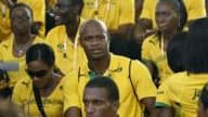Les athlètes jamaïcains autour d'Asafa Powell, lors de la cérémonie d'ouverture des Jeux.