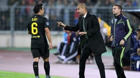 Xavi et Pep Guardiola, à Barcelone le 28 septembre 2011