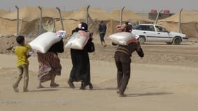 Des familles irakiennes de retour à Fallouja, le 6 juin 2016.