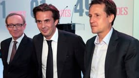 Les dirigeants de Canal Plus Bertand Meheut et Rodolphe Belmer entourant Yannick Bolloré.