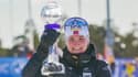 La joie de la Norvégienne Marte Olsbu Roeiseland, après avoir remporté le gros globe de cristal, récompensant la meilleure biathlète de la saison, le 18 mars 2022 à Oslo, à l'issue du sprint