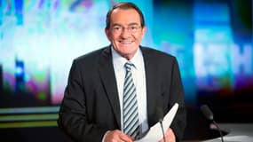 Jean-Pierre Pernaut, mythique présentateur du journal de 13h sur TF1, le 12 février 2015 dans un studio à Boulogne-Billancourt