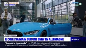 Rouen: un docteur en écologie colle sa main à une BMW pour alerter sur la pollution en Allemagne 