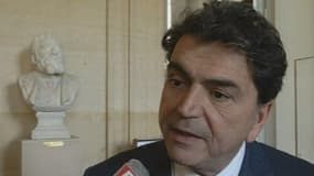 Pierre Lellouche, député UMP de Paris, au micro de RMC, à l'Assemblée nationale, le 19 février 2013