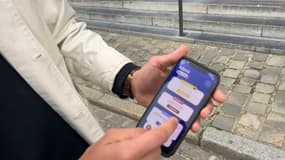 Un téléphone montrant l'application Adeno, créée par des étudiants de Sciences Po Lille pour aider les utilisateurs à faire leur choix pour les élections européennes 2024.