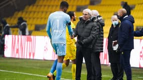 Alban Lafont et Raymond Domenech lors d'un match de Ligue 1 du FC Nantes, le 06/01/2021