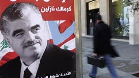 Portrait de Rafic Hariri, dans une rue de Beyrouth. Selon la télévision publique canadienne CBC, les enquêteurs de la Commission internationale indépendante d'enquête de l'Onu ont conclu que des membres du Hezbollah étaient les instigateurs de l'assassina