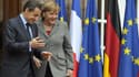 Nicolas Sarkozy et Angela Merkel à Strasbourg, mercredi. La France et l'Allemagne se sont donné jusqu'à fin janvier pour parvenir à une union budgétaire renforcée de la zone euro, un projet qui pourrait passer par la mise en quarantaine de plusieurs pays