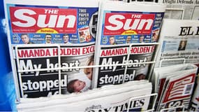 Des exemplaires du Sun, en 2012, dans un kiosque britannique. 