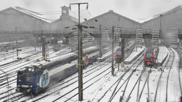 la gare Saint-Lazare sous la neige.