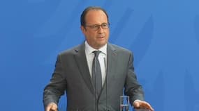 François Hollande en conférence de presse sur le dossier des migrants à Berlin.