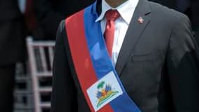 L'ancien chanteur pop Michel Martelly a prêté serment comme président samedi à Haïti, où il a demandé à ses compatriotes de l'aider à remettre sur pied leur pays en proie à la pauvreté et dévasté par le séisme du 12 janvier 2010. "Haïti était endormi et a