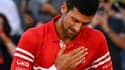 Le Serbe Novak Djokovic ému après sa victoire en finale de Roland-Garros contre le Grec Stefanos Tsitsipas, le 13 juin 2021