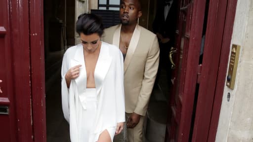 Kim Kardashian et Kanye West, quittant Paris le 24 mai.