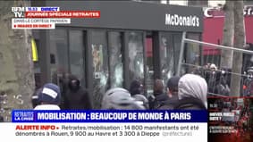 Paris: des manifestants brisent la vitre d'un fast-food 
