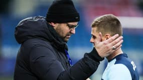 Mathieu Bodmer saluant Alois Confais avant un match de Coupe de France, le 21 janvier 2024