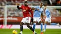Paul Pogba (Manchester United) face à Fernandinho (Manchester City)