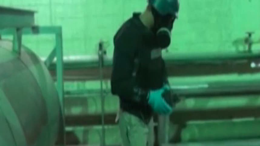 Un inspecteur de l'OIAC en mission en Syrie. Un inspecteur de l'OIAC en mission en Syrie.