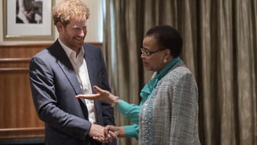 Le prince Harry au côté de la veuve de Nelson Mandela, Graca Machel.