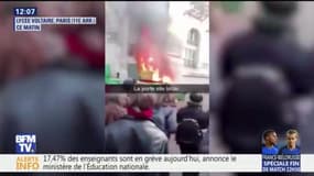 Journée de mobilisation : des poubelles incendiées devant le lycée Voltaire à Paris